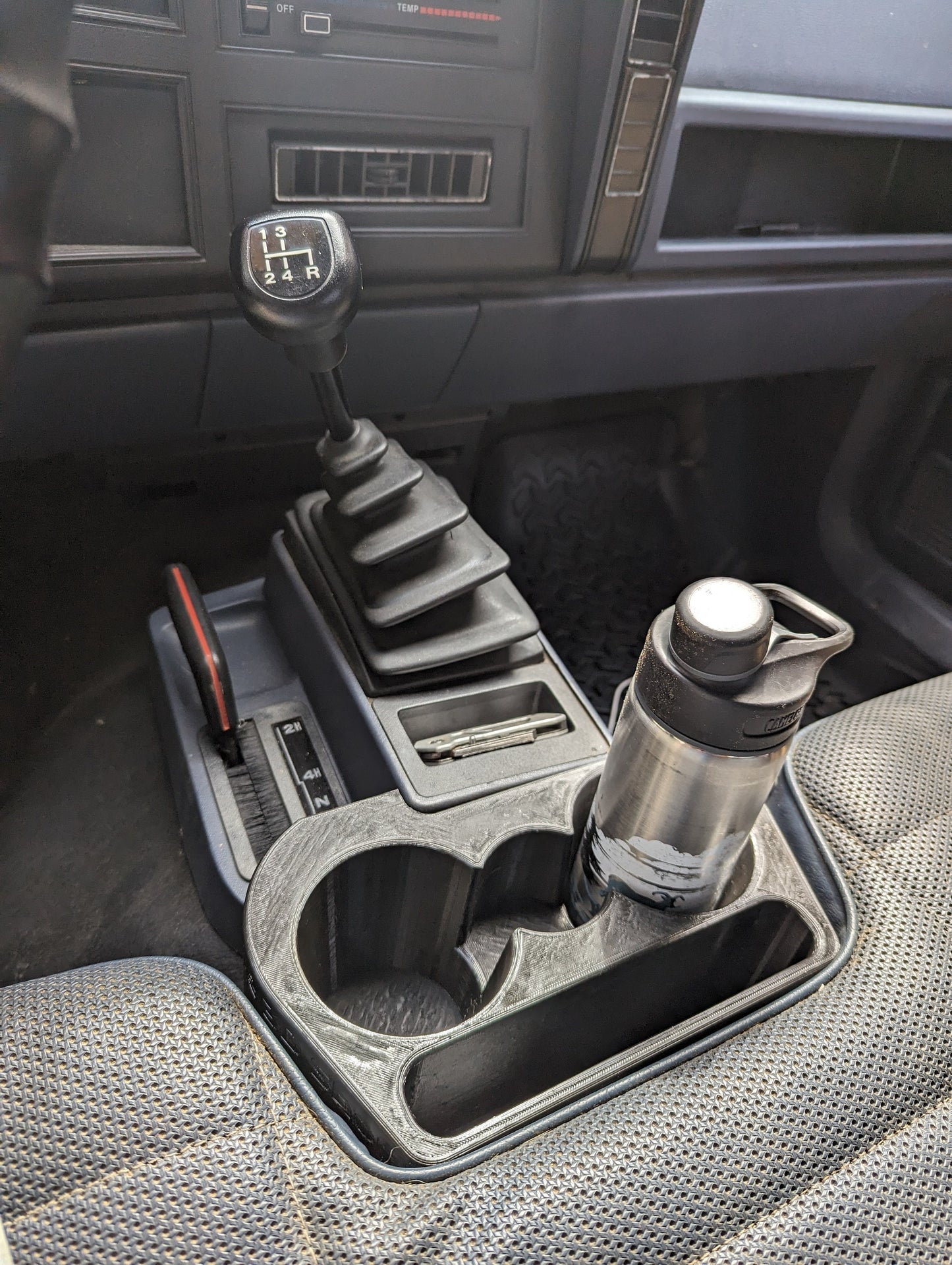 Cup Holder for a Jeep Comanche